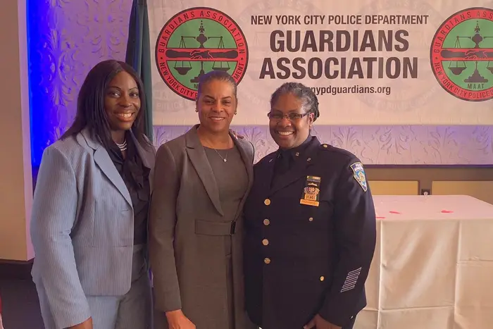 Detective Felicia Richards on the right, next to two other women